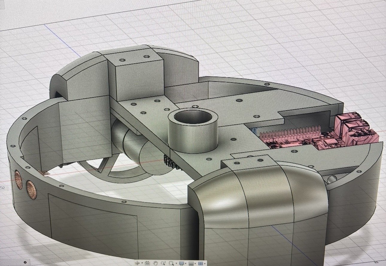 Fusion 360 model of the roomba-style chassis, with a central hub, drive wheel, curved bumper covers and an electronics bay
